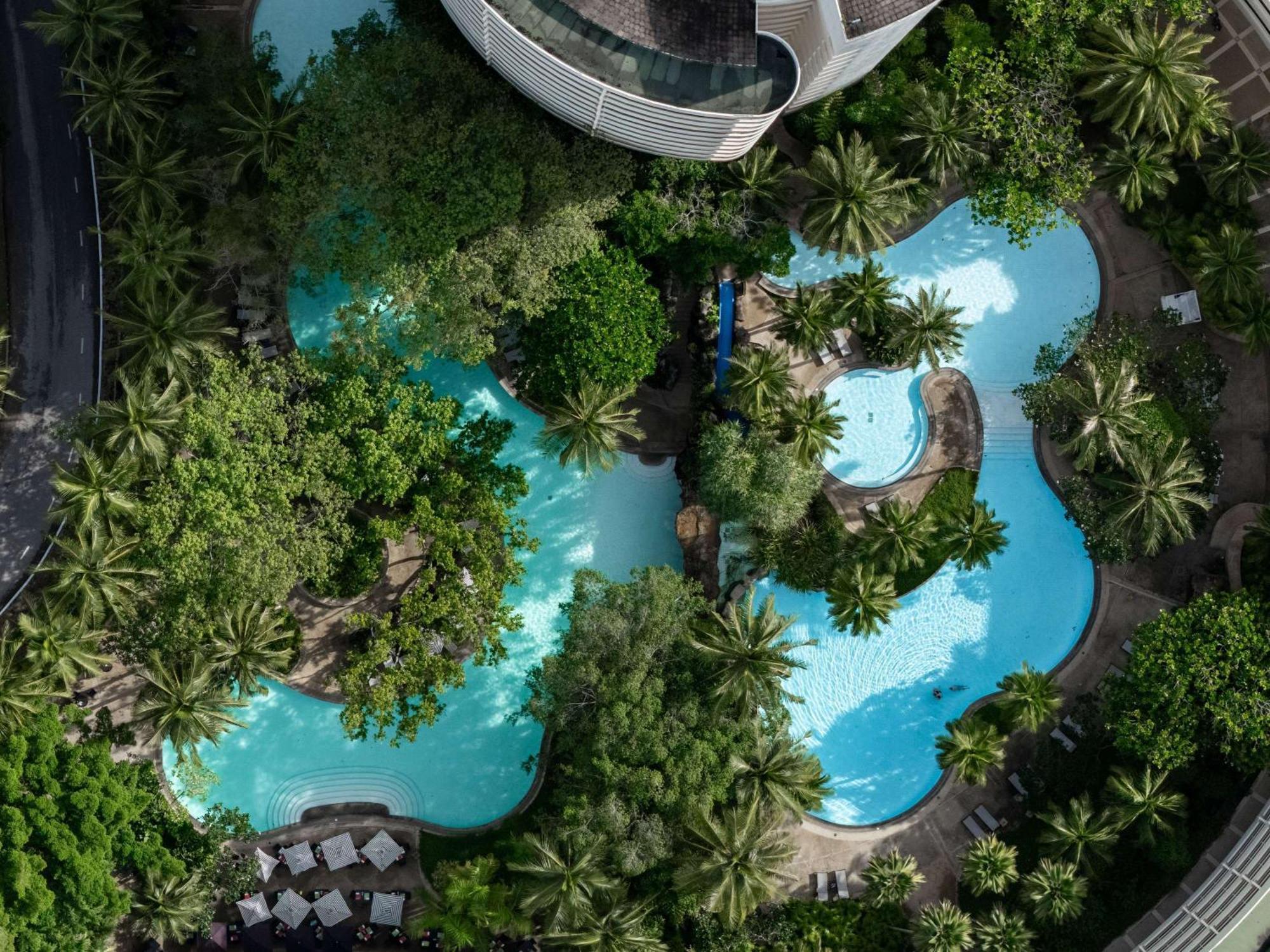普吉岛阿卡迪亚希尔顿水疗度假村 Karon 外观 照片 The pool at the hotel